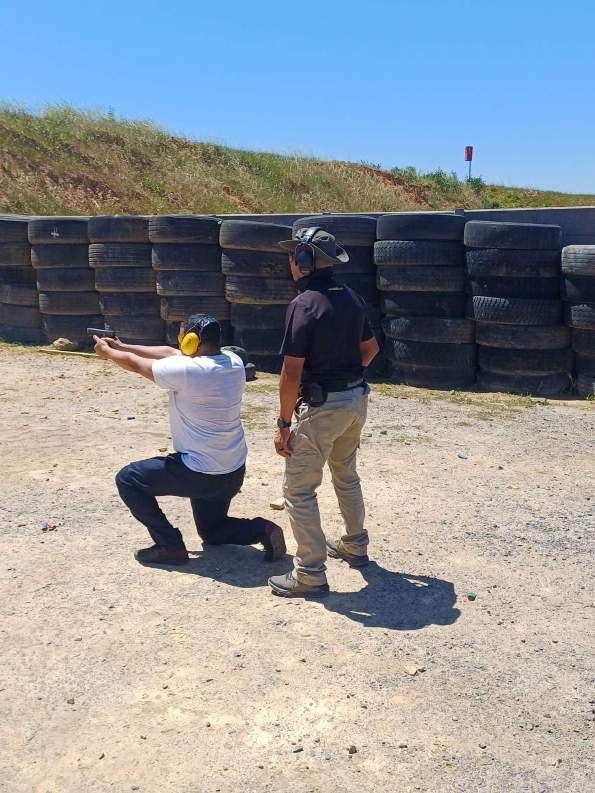 Weapon systems laid out for a firearm competency session