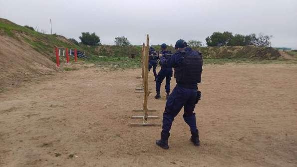 Officers stacked against a wall during a room entry drill